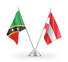 Austria and Saint Kitts and Nevis table flags isolated on white 3D rendering