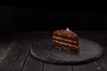 Chocolate pie. A piece of chocolate cake. Cake and chocolate chips.