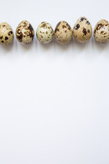 quail eggs on a white background. Easter and easter decoration