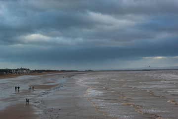 Windy and stormy day at sea side in uk.Weather condition background.