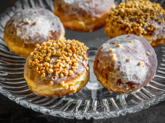 Many donuts on dark table background