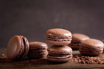 chocolate macaroons on a wooden table