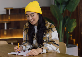 Korean student studying, learning language, exam preparation at modern library, education concept....