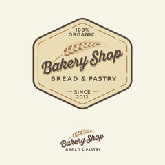 Bakery logo. Bread Shop emblem. Lettering and spikelet in a hexagon badge.