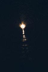 Man and Light at the End of the Tunnel