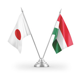 Hungary and Japan table flags isolated on white 3D rendering