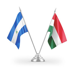 Hungary and Nicaragua table flags isolated on white 3D rendering