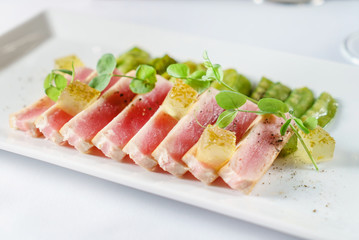 tuna with young peas and sauce