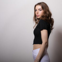 Young beautiful girl studio portrait.