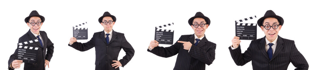Funny man in elegant suit with movie clapboard isolated on white