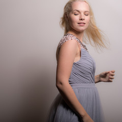 Young beautiful girl studio portrait.