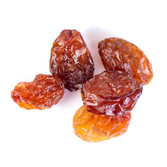 Raw raisins, dried grape isolated on white background