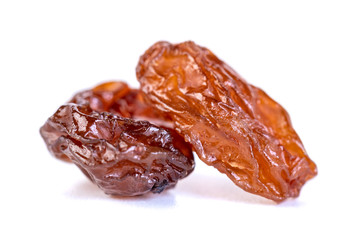 Raw raisins, dried grape isolated on white background