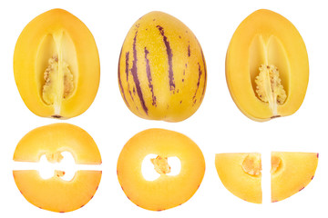 Fresh Pepino fruit with leaves isolated on white background. Top view, flat lay