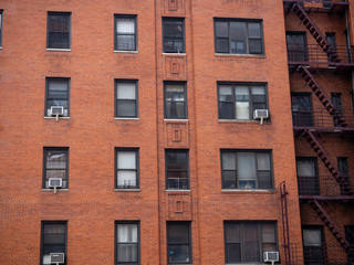 Fototapeta na wymiar close view of classic brick facade from building in New York City