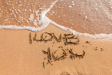 I love you written on the beach