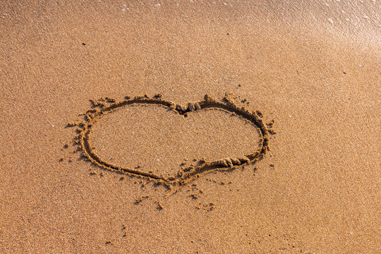 I love you written on the beach