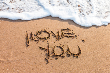 Fototapeta premium I love you written on the beach