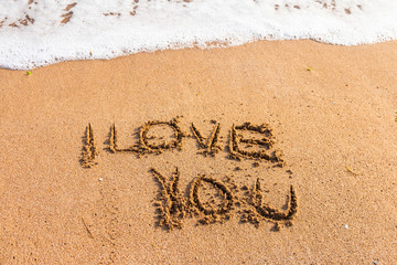 I love you written on the beach
