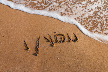 I love you written on the beach