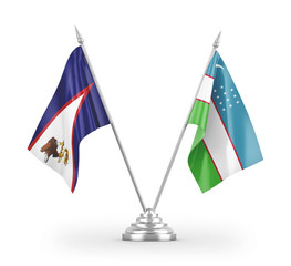 Uzbekistan and American Samoa table flags isolated on white 3D rendering