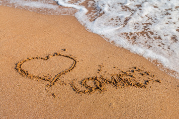 I love you written on the beach