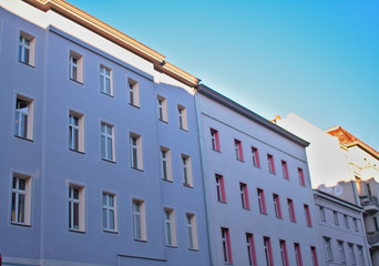 Blue pastel apartment facade landscape in Schoneberg Berlin Germany