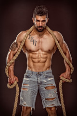 Handsome Muscular Macho Men Wrapped Up In RopesHandsome Muscular Macho Men Wrapped Up In Ropes