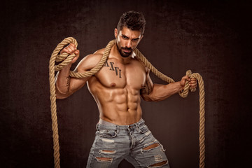 Handsome Muscular Macho Men Wrapped Up In RopesHandsome Muscular Macho Men Wrapped Up In Ropes