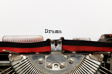 Drama title text written on paper with vintage typewriter