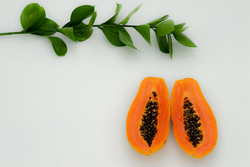 green backgrounds and papaya fruits