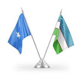 Uzbekistan and Somalia table flags isolated on white 3D rendering