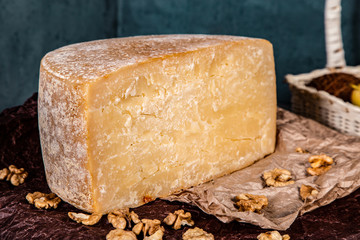 Big yellow part of goat cheese heads on a blue background.