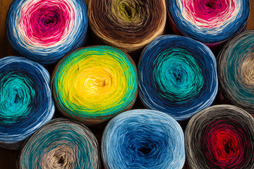 Background with balls of wool of various colors for knitting