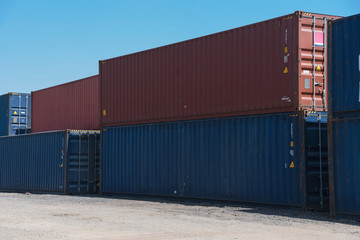 Shore crane loading containers in fiscal warehouse Logistics
