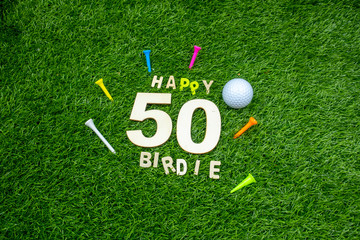 Golf 50th Birthday with golf ball and tee on green grass
