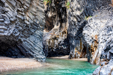 Alcantara river with basalt geological formations. Gole Alcantara Botanical and Geological Park in...