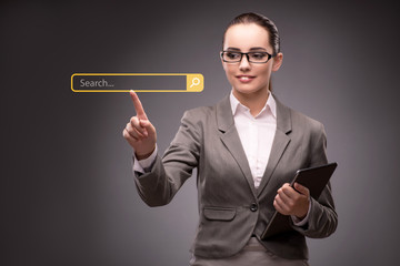 Search concept with businessman pressing button
