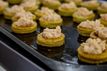 mini tarts on a plate with cream