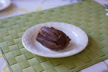 sweet chocolate tamales on a plate