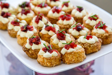 pastries with jam cream and berries