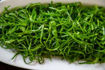 green beans in bowl on white background