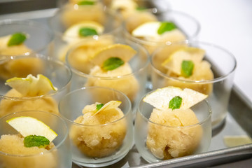 dessert with fruits sorbets on ice