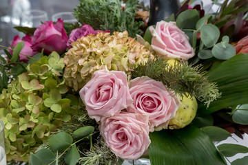 botanical flower arrangements with roses and leaves