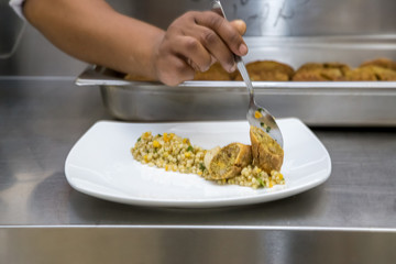 chef preparing food in kitchen
