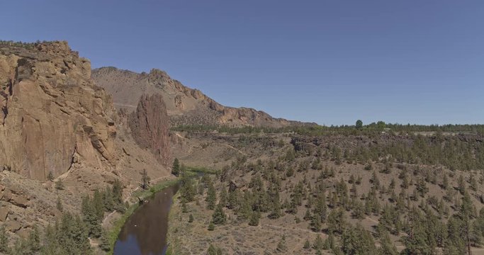 Oregon Aerial v31 Fly through of Smith Rock State Park, passing by Asterix toward park entrance - June 2018