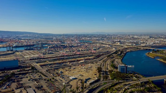 Shipyard Aerial v31 Hyperlapse flying over Long Beach Shipyard Industrial Cityscape with jet streams - October 2019