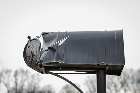 Mailbox That Has Been Hit And Damaged By Car