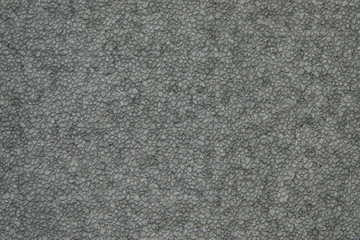 A texture resembling small, grey stones is shown as solid background surface.