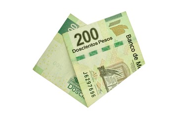Obraz na płótnie Canvas A single middle folded 200 mexican peso bill isolated on white background